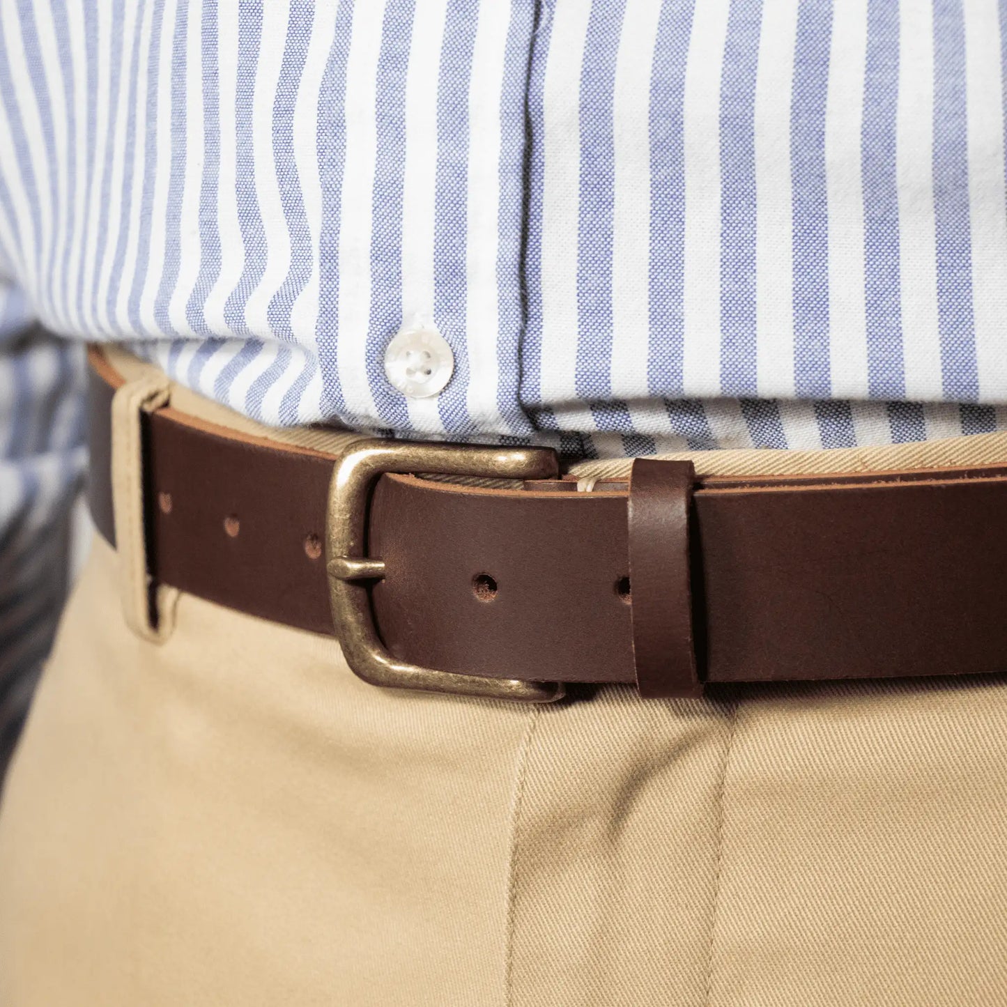 Man wearing the Everyday Brown Leather Belt, highlighting premium craftsmanship and showcasing this timeless New Zealand accessory.