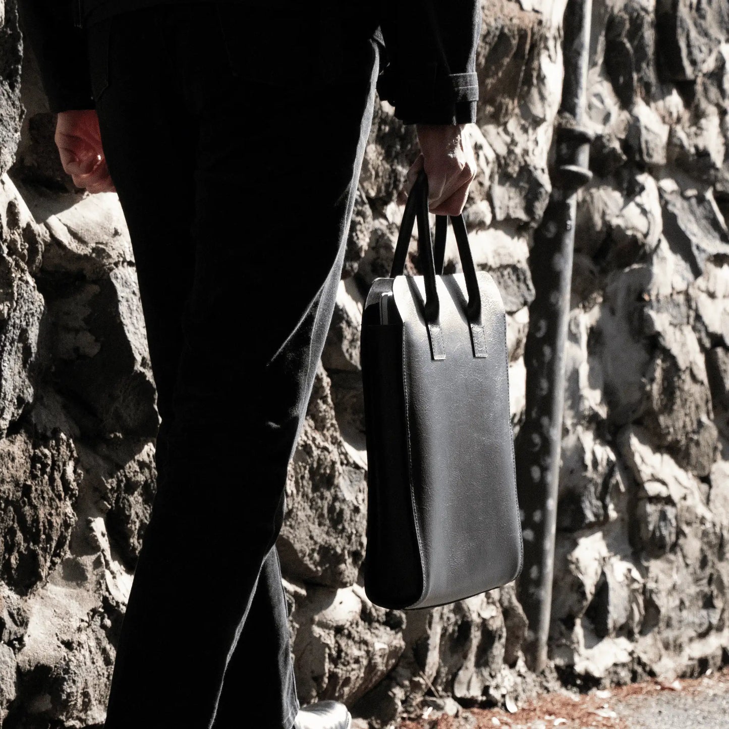 Gentleman carrying a Premium Black Leather Business Tote - Crafted in New Zealand