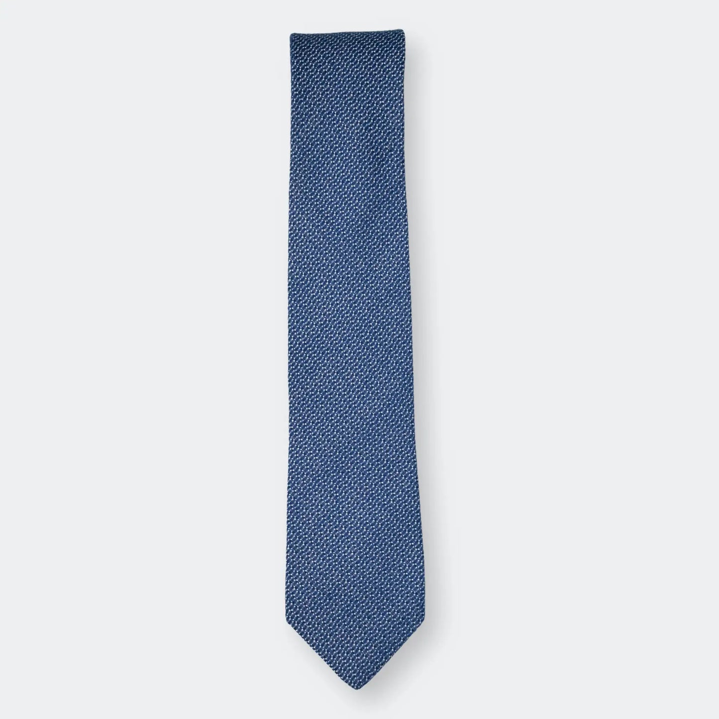Mid Blue and White Jacquard Tie folded on white background, highlighting fine weave and crisp jacquard detailing.