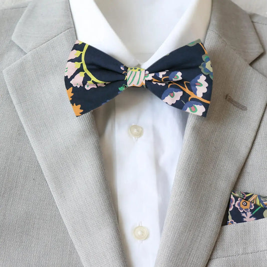 Liberty London Symphony bow tie and pocket square on a gray suit jacket