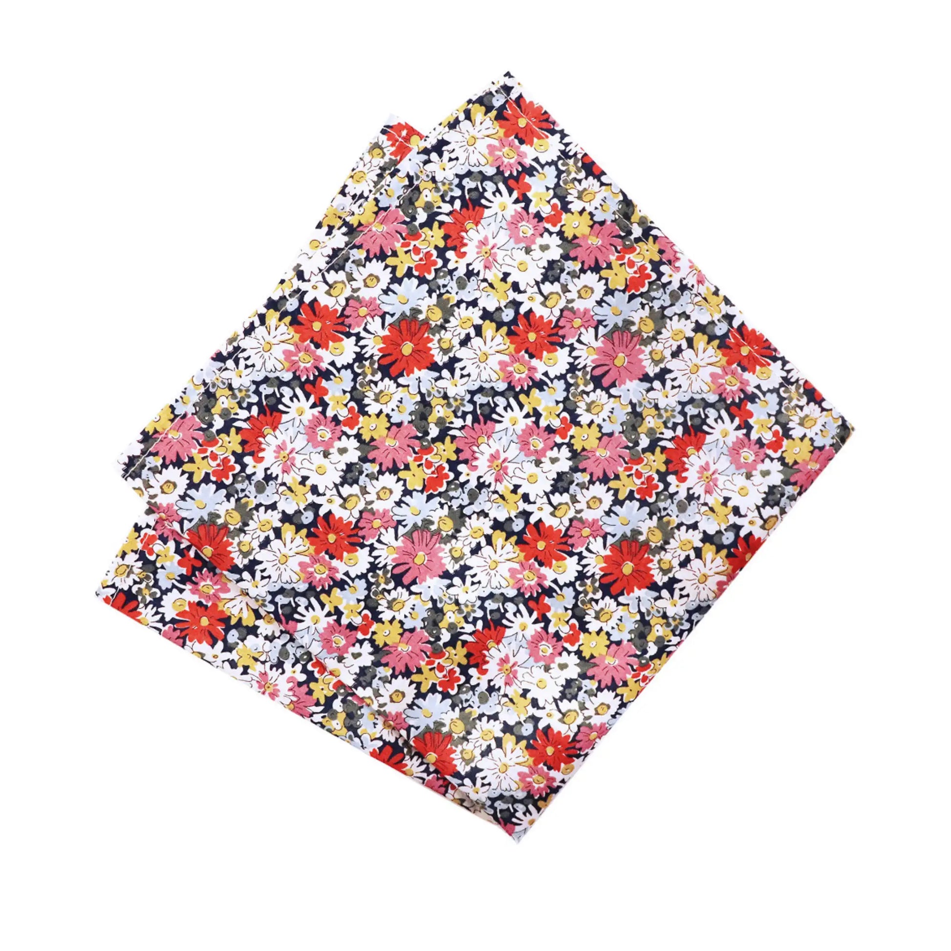 Liberty London’s Libby Tana Lawn fabric pocket square featuring vibrant daisy print. Parisian Crafted x Liberty collaboration with a colorful floral design—eye-catching accessory for sophisticated menswear.