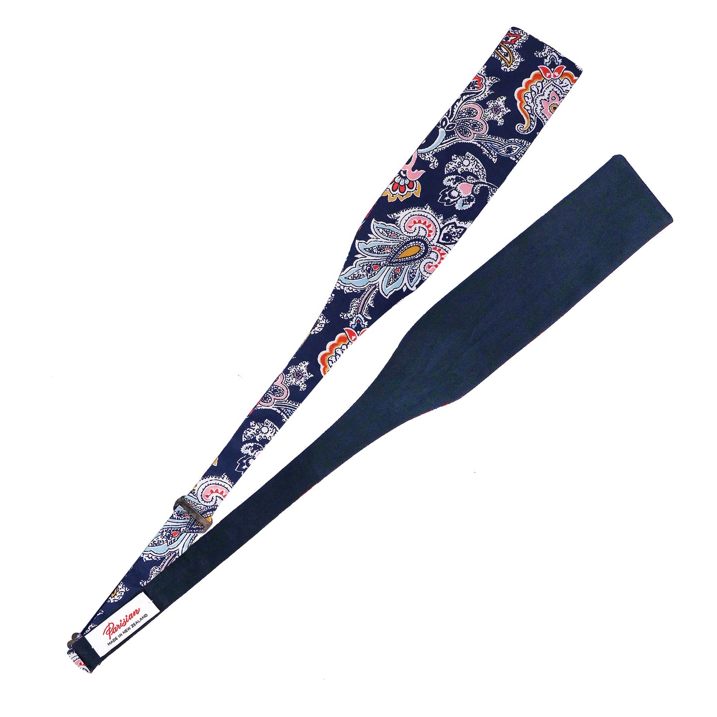 The Louis Tie Your Own Bow lying on a white background showing the woven 'Parisian Made in New Zealand' label.