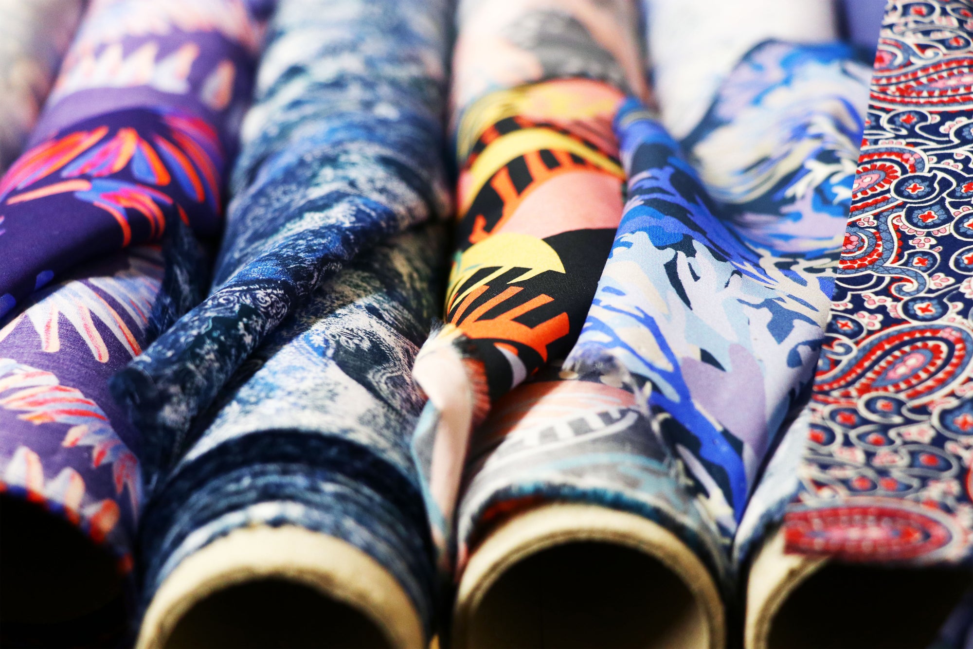 Liberty Cotton fabric rolls close up of new designs