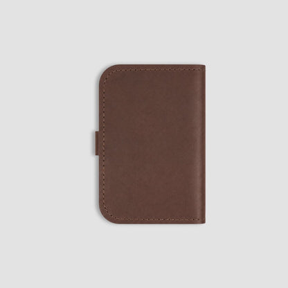Back of brown leather notebook on a white background