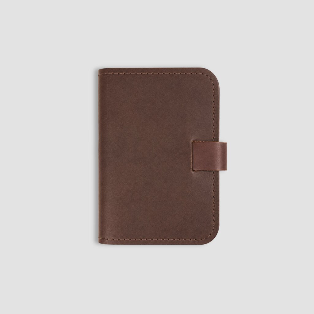 Brown leather A6 notebook on a white background