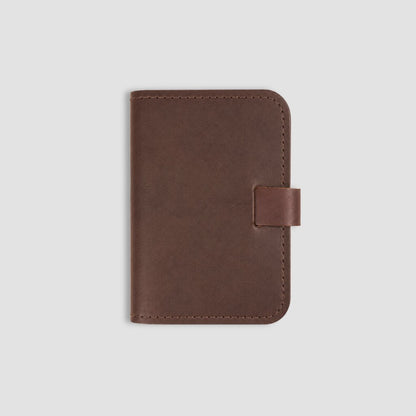 Brown leather A6 notebook on a white background