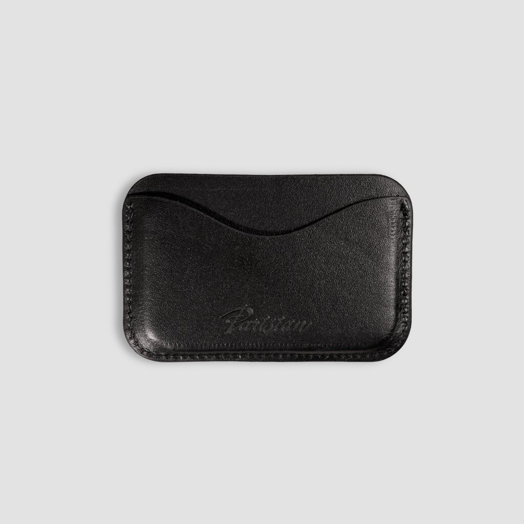 Black leather cardholder with 'Parisian' branding on a white background
