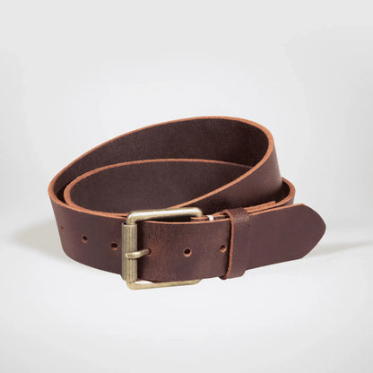 Mocha-brown Leather work belt rolled on white surface, with brass buckle.
