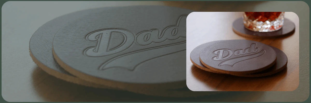 Leather coaster with 'Dad' engraving on a gray background