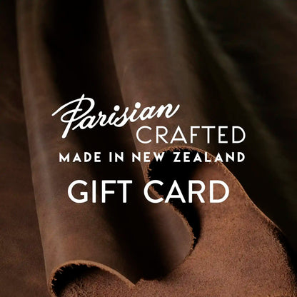 The text 'Parisian Crafted Made in New Zealand Gift Card' on top of an image of brown leather