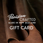 The text 'Parisian Crafted Made in New Zealand Gift Card' on top of an image of brown leather