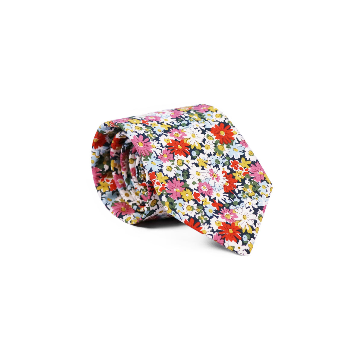 The Libby Tie rolled up on a white background.